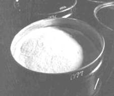 Powdered yellowcake in a drum.