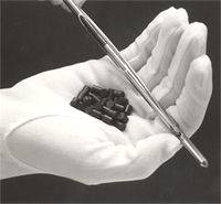 Nuclear fuel - a compact, inert, insoluble solid.