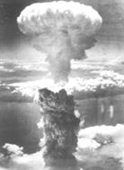 The Fat Man mushroom cloud resulting from the nuclear explosion over Nagasaki rises 18 km (11 mi, 60,000 ft) into the air from the hypocenter.