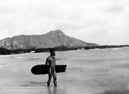 B15, By the End of the 19th Century Surfing Was its Lowest Ebb. This Lone Hawaiian Surfer at Waikiki Beach Carries One of the Last Alaia Boards to Be Ridden There.